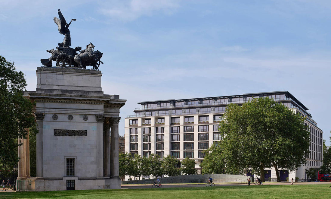 Exterior view of The Peninsula London hotel overlooking Hyde Park, showcasing its contemporary architecture